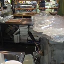 Behind the scenes. This little shop sits right in the middle of a farmers markets. Behind the scenes. This little shop sits right in the middle of a farmers markets.
