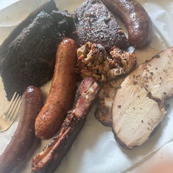 Cattleack Barbeque - A close up on the Cattelack BBQ sampler platter. - Barbeque Near Me - Dallas, Texas