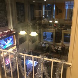 Downstairs dining from upstairs. Downstairs dining from upstairs.