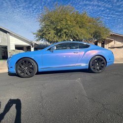 All God Auto - Crazy color changing wrap done on this Bentley.  Blue film that changes to pink in certain lighting.