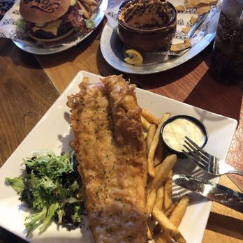 Ford's Garage St. Augustine - GIANT fish and chips, and the American standard burger. We also had some buffalo chicken dip. - Burgers Near Me - St. Augustine, Florida