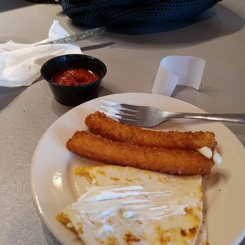 J-N-G Grill - Cheese sticks from the 5,4,3,2,1 appetizer and a piece of the cheese quesadilla - American Near Me - New Philadelphia, Ohio