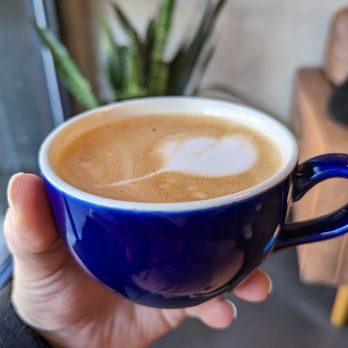 Red Emma's Bookstore Coffeehouse - Flat white with oat milk - Bookstores Near Me - Baltimore, Maryland Red Emma's Bookstore Coffeehouse - Flat white with oat milk - Bookstores Near Me - Baltimore, Maryland