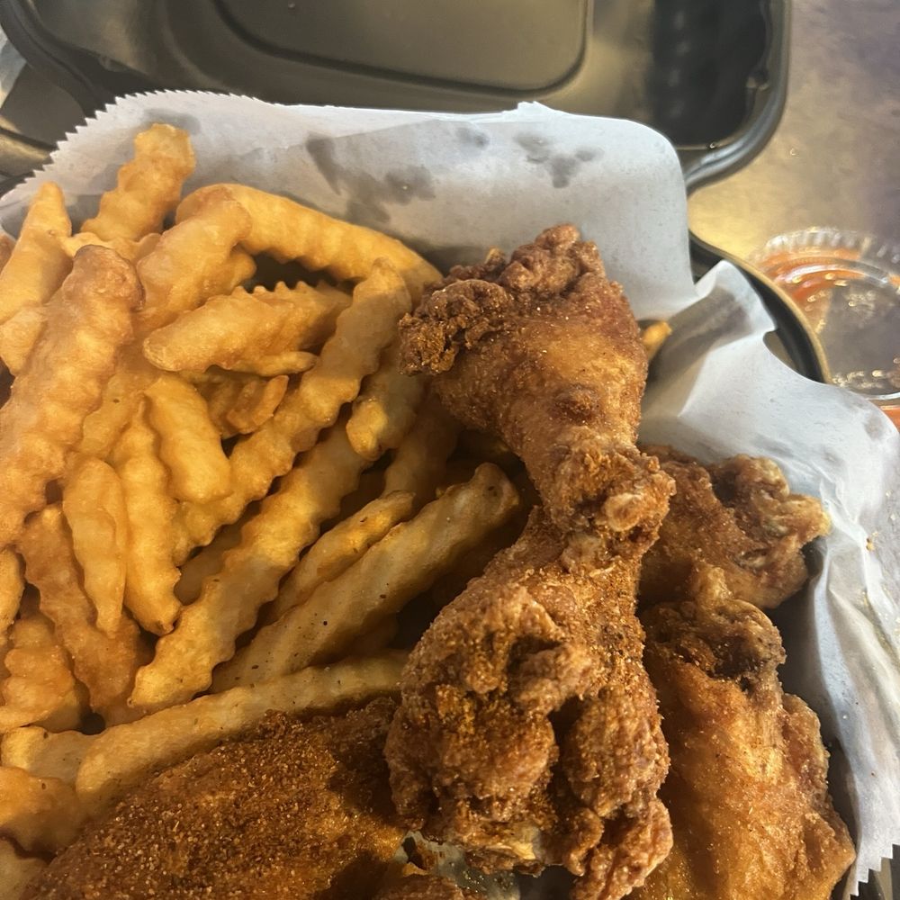 Fried Chicken and fries. Fried Chicken and fries.