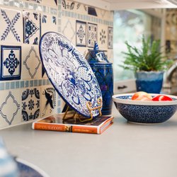 Patrician Design - 2019 Kitchen remodel back-splash all the way to ceiling - traditional blue & white Talavera w/insets of hand-cut aqua glazed Spanish tile!