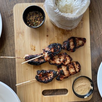 Baan Thai Bistro - Bbq satay pork served with sticky Thai rice and Thai peanut sauce and a sweet chili sauce - Thai Near Me - Indianapolis, Indiana Baan Thai Bistro - Bbq satay pork served with sticky Thai rice and Thai peanut sauce and a sweet chili sauce - Thai Near Me - Indianapolis, Indiana
