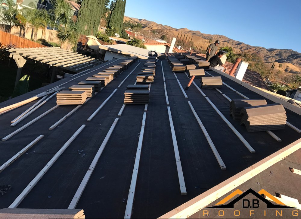 Slide of D.B Roofing