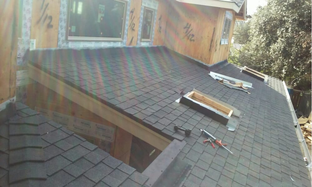 Slide of Teal City Roofing