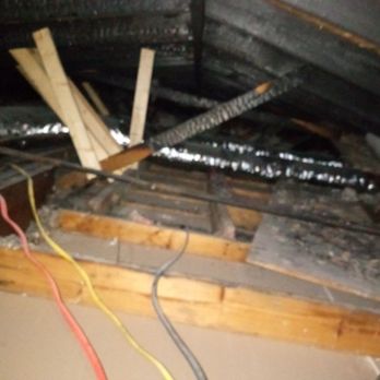 Jones Roofing & Construction - Burnt wood in roof - Roofing Near Me Jones Roofing & Construction - Burnt wood in roof - Roofing Near Me