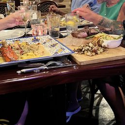 Neighbors food. Special. Lobster and porterhouse