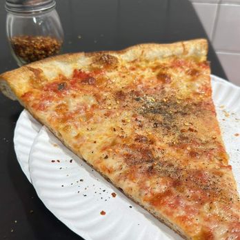 Basile's Pizza - Cheese is the bomb - Pizza Near Me - Hoboken, New Jersey Basile's Pizza - Cheese is the bomb - Pizza Near Me - Hoboken, New Jersey
