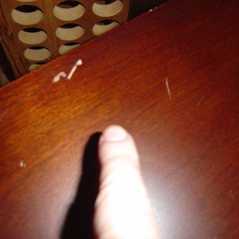 Two Men and a Truck Moving and Storage - more scratches on the tv stand - Movers Near Me - Lansing, Michigan