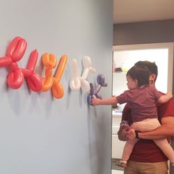 Derek W. Banks DDS - Banks Pediatric Dentistry - Choosing her balloon animal on our way out =)