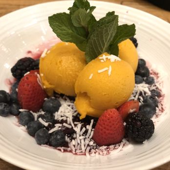 Cafe Landwer - Rutherford & Bathurst - "The Mango Perfume"  A mango sorbet w/ mixed berries and coconut that'll make you want to be a better person. - Cafes Near Me - Maple, Ontario