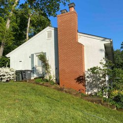 Rooftop Chimney Sweeps - A job well done - this chimney was so badly damaged we had to tear it to the ground and start over - results speak for themselves!