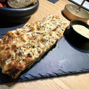 Oise Ristorante - Bread sticks with cacio e Pepe sauce - Wine Bars Near Me - Fort Myers, Florida Oise Ristorante - Bread sticks with cacio e Pepe sauce - Wine Bars Near Me - Fort Myers, Florida