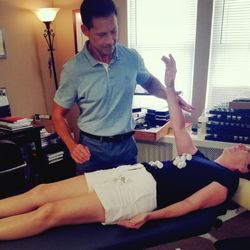 Castaldi Louis, DC - Dr. Castaldi seen performing Nutrition Response Testing on his patient Maureen.