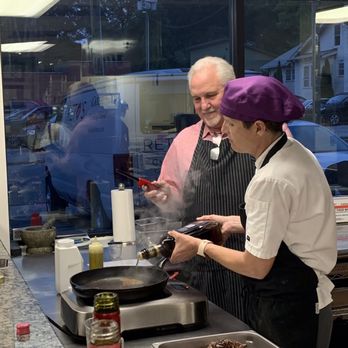 Reto's Kitchen - Making the cognac sauce with our chef Brandy - Caterers Near Me - Greensboro, North Carolina Reto's Kitchen - Making the cognac sauce with our chef Brandy - Caterers Near Me - Greensboro, North Carolina