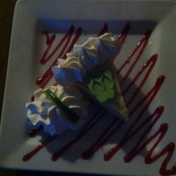 Hobo's Cafe - Pic is a bit dark, but the key lime pie is both pretty and tasty! - New American Near Me - Key Largo, Florida Hobo's Cafe - Pic is a bit dark, but the key lime pie is both pretty and tasty! - New American Near Me - Key Largo, Florida