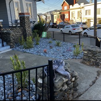 Fisher Garden & Landscape Services - a garden with rocks and plants - Tree Services Near Me - San Mateo, California Fisher Garden & Landscape Services - a garden with rocks and plants - Tree Services Near Me - San Mateo, California