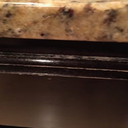 Kb Kitchen & Bath Concepts - Eroding finish on "Quality" Cabinets by Masco.
