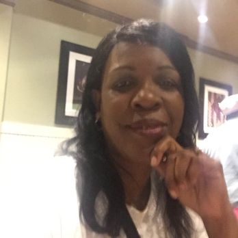 Huddle House - a woman in a restaurant - Diners Near Me - Philadelphia, Mississippi