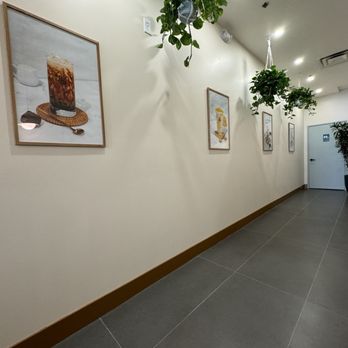 Daboba - a long hallway with tables and chairs - Bubble Tea Near Me - Gilbert, Arizona