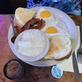 La Croisette - 2 eggs with bacon, grits, and sourdough. Highly recommend the grits! - Breakfast & Brunch Near Me - St. Pete Beach, Florida La Croisette - 2 eggs with bacon, grits, and sourdough. Highly recommend the grits! - Breakfast & Brunch Near Me - St. Pete Beach, Florida