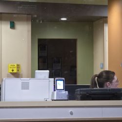 St. Anthony Hospital - The front desk that does nothing all day they constantly talk about what they're going to have for lunch.