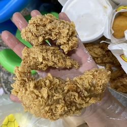 Chicken Express - We got 3 tiny chicken "strips" with our #2 (7 piece for $17) .. most of it was breading. Ridiculous.