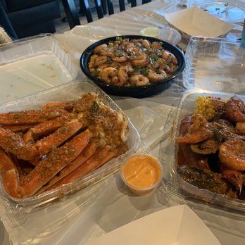 CP Seafood & Daquiri Bar - (From left to right) Snow Crab Cluster, MVP Fried rice, Final Four - Cajun/Creole Near Me - Houston, Texas CP Seafood & Daquiri Bar - (From left to right) Snow Crab Cluster, MVP Fried rice, Final Four - Cajun/Creole Near Me - Houston, Texas