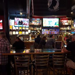 people sitting at the bar
