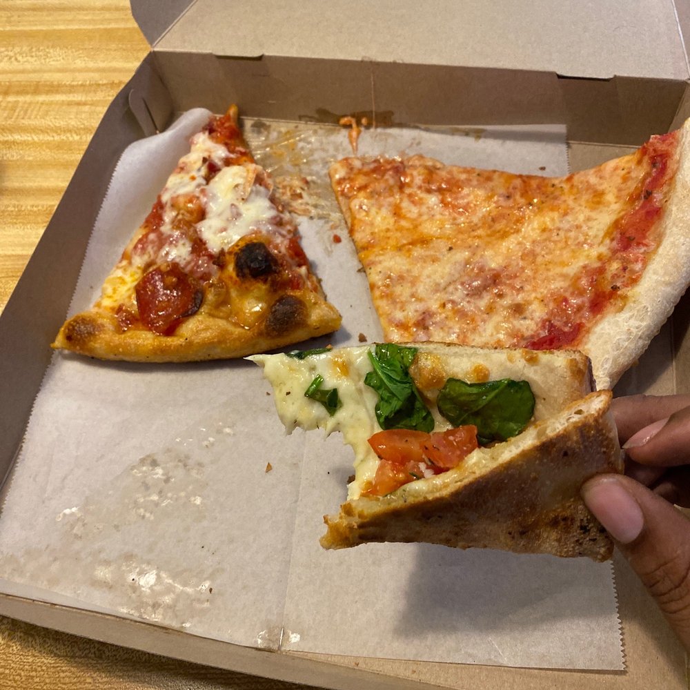 Pizza here is exquisite definitely check them out I would like to see more happy faces tho as far as service Pizza here is exquisite definitely check them out I would like to see more happy faces tho as far as service