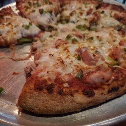 Pizza with chicken, peppers and onions