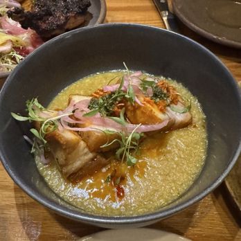 Kayu - Pork belly with curried rice grits - Cocktail Bars Near Me - Washington, DC, District of Columbia