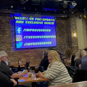 Denver Improv - a group of people sitting at a table - Comedy Clubs Near Me - Denver, Colorado Denver Improv - a group of people sitting at a table - Comedy Clubs Near Me - Denver, Colorado