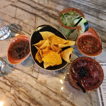 Caló Kitchen + Tequila - Chips, salsa and bean dip - Cocktail Bars Near Me - Costa Mesa, California Caló Kitchen + Tequila - Chips, salsa and bean dip - Cocktail Bars Near Me - Costa Mesa, California
