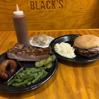 Black's Barbecue Lockhart - Brisket sandwich, ribs, green beans, & jalapeño cheddar sausage ring - Barbeque Near Me - Lockhart, Texas