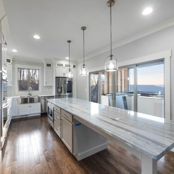 Cole Construction - a kitchen with a large island - General Contractors Near Me - Chattanooga, Tennessee