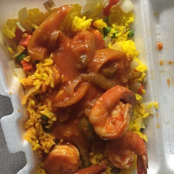 Calle 191 Pescaderia - Shrimp over yellow rice - Seafood Markets Near Me - New York, New York Calle 191 Pescaderia - Shrimp over yellow rice - Seafood Markets Near Me - New York, New York