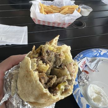 Georgie’s Mediterranean Cuisine - The Beef Shawarma Wrap was bomb and very filling - Mediterranean Near Me - Riverside, California Georgie’s Mediterranean Cuisine - The Beef Shawarma Wrap was bomb and very filling - Mediterranean Near Me - Riverside, California