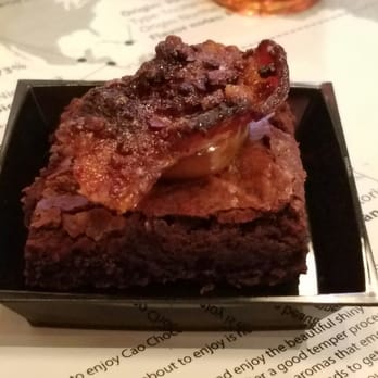 Cao Chocolates - Dark chocolate brownie with caramel and bacon. - Food Delivery Services Near Me Cao Chocolates - Dark chocolate brownie with caramel and bacon. - Food Delivery Services Near Me