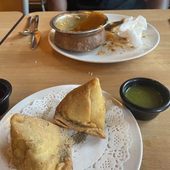 The Little India Restaurant - Somosas: the crust is so light and flaky, filled with seasoned potatoes and peas then dusted with spices. Simple and Delicious - Indian Near Me - Indianapolis, Indiana The Little India Restaurant - Somosas: the crust is so light and flaky, filled with seasoned potatoes and peas then dusted with spices. Simple and Delicious - Indian Near Me - Indianapolis, Indiana