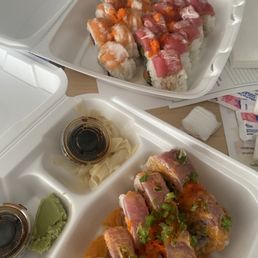 Top left: orange blossom roll, top right: cherry blossom roll, bottom: samurai roll Top left: orange blossom roll, top right: cherry blossom roll, bottom: samurai roll