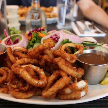 Fish and Sips - Calamari with a garden salad & balsamic vinaigrette - Fish & Chips Near Me - Collingwood, Ontario Fish and Sips - Calamari with a garden salad & balsamic vinaigrette - Fish & Chips Near Me - Collingwood, Ontario