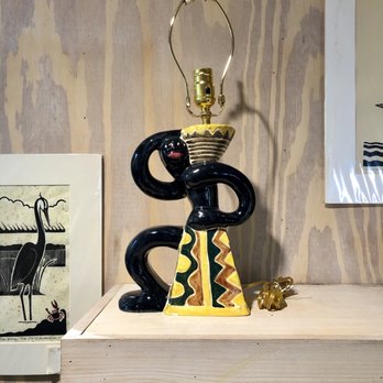 Shearwater Pottery - Yes, that is a lamp made of a stereotyped black figure. - Home Decor Near Me - Ocean Springs, Mississippi Shearwater Pottery - Yes, that is a lamp made of a stereotyped black figure. - Home Decor Near Me - Ocean Springs, Mississippi