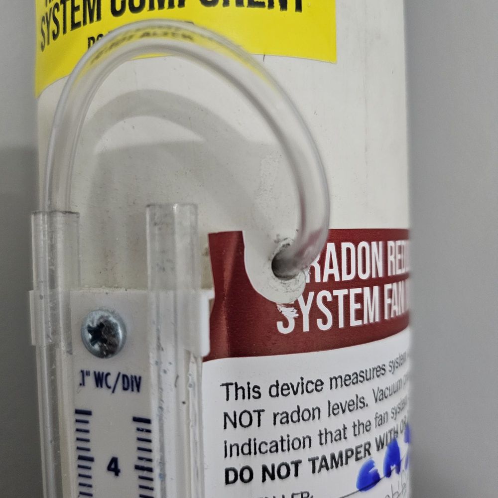 Certified Radon Solutions - Loose manometer in radon pipe - Home Inspectors Near Me - Mansfield, Massachusetts