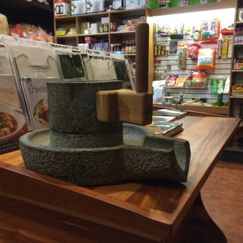 Bangkok Market - A flour grinder. In all the time I lived in SE Asia, I never saw this thing. A delight to see it here in the noodle room. - International Grocery Near Me - Nashville, Tennessee