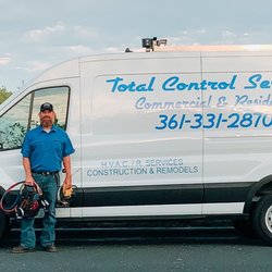 Total Control Services - Loaded service vehicle ready to serve you