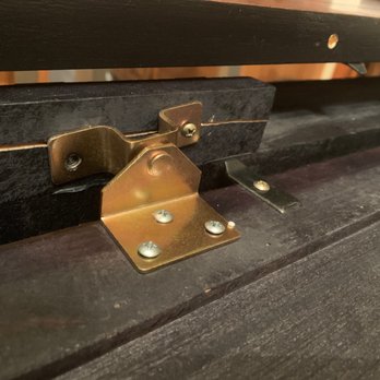 Ashley Store - This is part of the leaf system. It is missing a screw and the other screw was installed crooked and split the wood. - Furniture Stores Near Me - Whitestown, Indiana Ashley Store - This is part of the leaf system. It is missing a screw and the other screw was installed crooked and split the wood. - Furniture Stores Near Me - Whitestown, Indiana